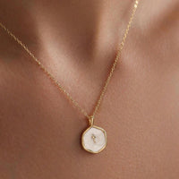 Collana di protezione con perla e croce