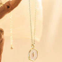 Collana di protezione con perla e croce